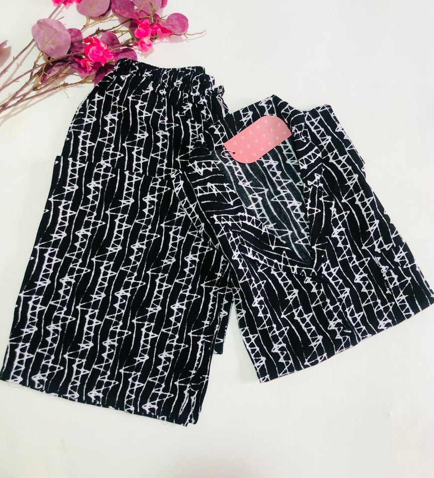 Pyjama Femme  en Tissu Rallons – Élégance et Douceur pour des Nuits Sereines 🌙🌿
