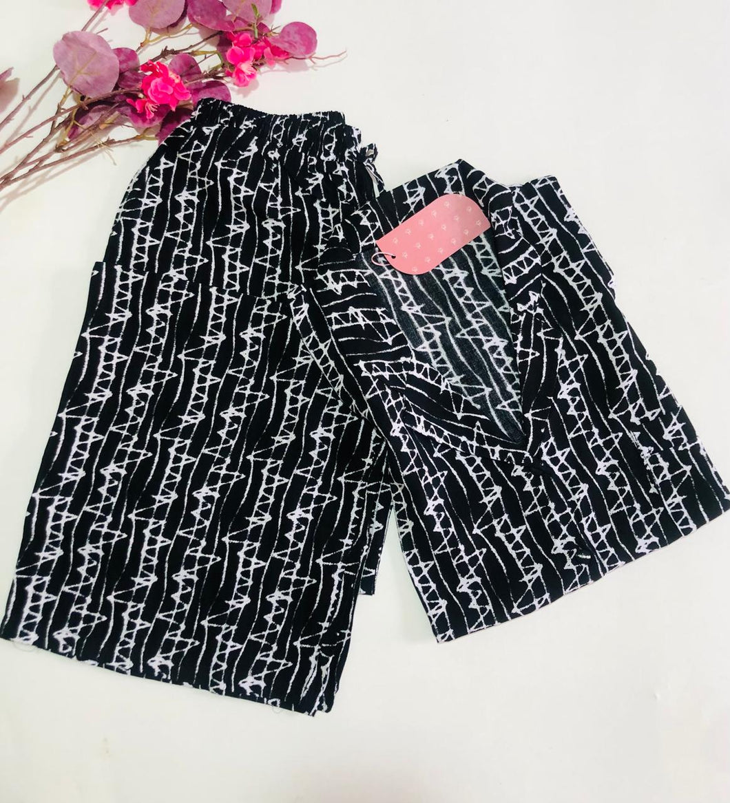 Pyjama Femme  en Tissu Rallons – Élégance et Douceur pour des Nuits Sereines 🌙🌿